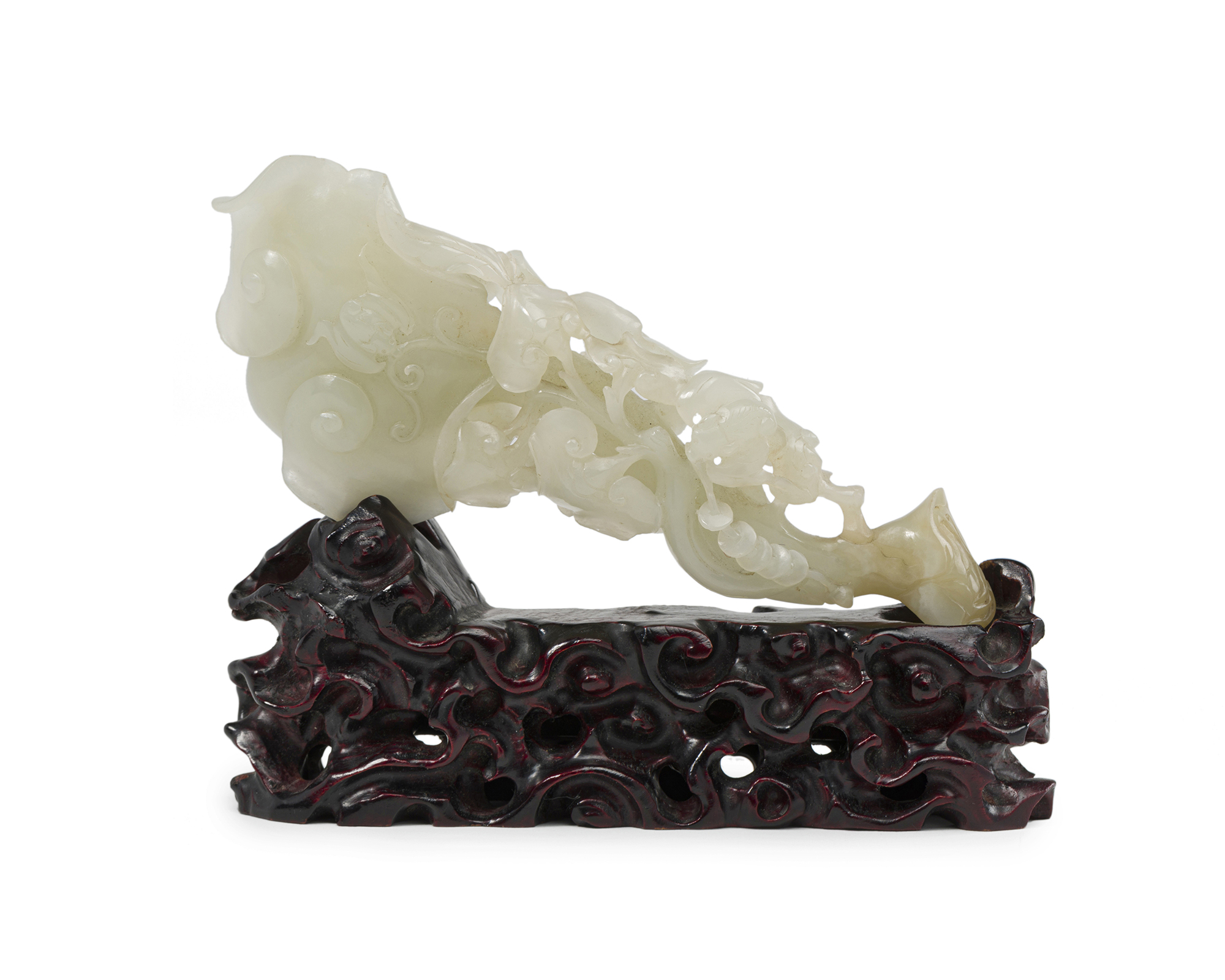 A Chinese carved jade with wooden stand