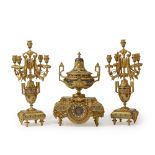 A gilt-bronze and champlevé clock and garniture set