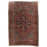 A Persian Heriz carpet