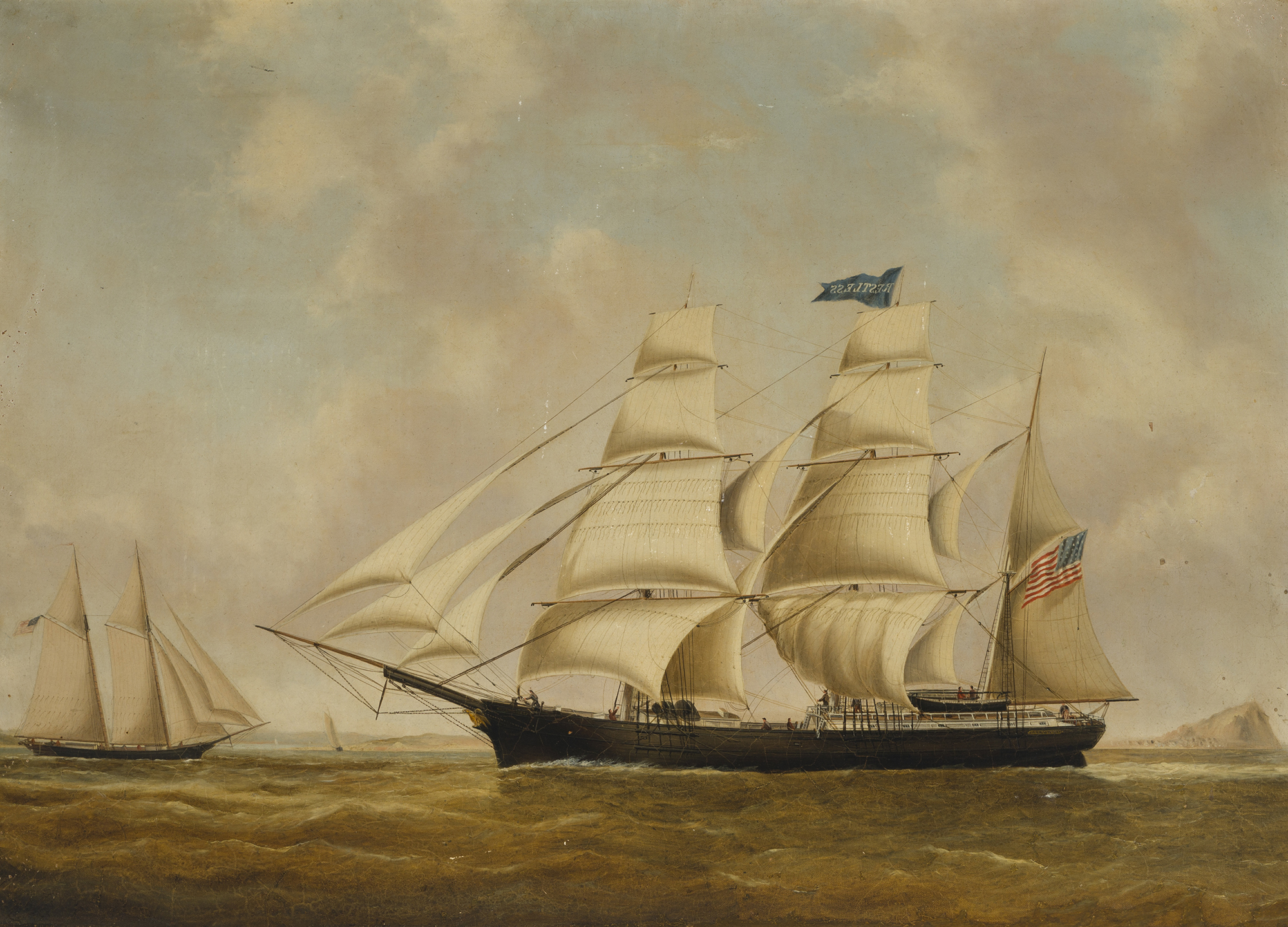 USS Restless under full sail