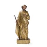 A carved and giltwood Santos figure