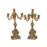 A pair of French Louis XV-style gilt-bronze and champlevé five-light candelabra