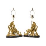 A pair of French Louis XV-style gilt-bronze figural lamps