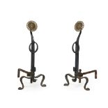 A pair of wrought iron and brass andirons