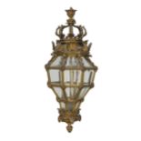 A bronze and glass chandelier