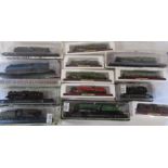 13 boxed collectable die cast model trains on plinths