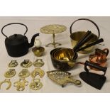 Selection of brass saucepans, horse brasses, squirrel trivet, kettle etc.