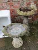 2 stone bird baths