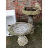 2 stone bird baths