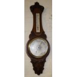 Edwardian carved oak aneroid barometer & thermometer