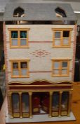 Large shop front dolls house with accessories