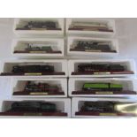 12 boxed die cast model trains on wooden plinths