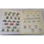 Stamp album containing British mint stamps (unhinged) (approximately £50-60 face value)
