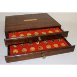 Cased 2 drawer set "Our Royal Sovereigns" - 70 silver gilt medals portraying monarchs from Offa to