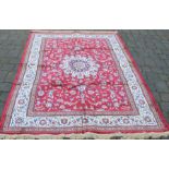 Red ground cashmere carpet with medallion design 2.40m by 1.60m