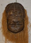 Carved wooden tribal mask  Ht 50cm