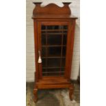 Edwardian mahogany music cabinet on a stand