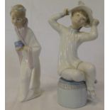 Lladro figurine of a seated girl holding her hat (af) and a girl in a crown