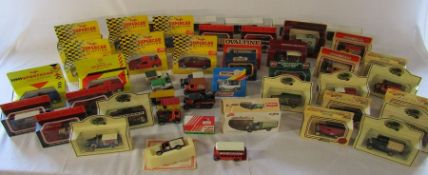 Quantity of boxed die cast model cars inc Lledo, Corgi and Matchbox