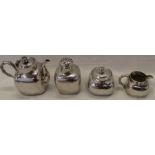 Chinese export silver 4 piece tea service, of rounded square shape with hammered decoration, bearing