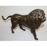 Large cast metal bronzed lion