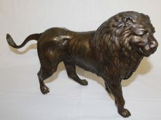 Large cast metal bronzed lion
