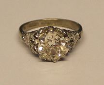 18ct white gold old cut diamond solitaire ring with diamond accents to the shoulders,