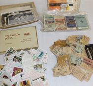 Selection of cigarette cards, boxes, old railway tickets, ration books, black and white photos etc.