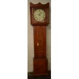 Modern battery powered longcase clock in a pine case