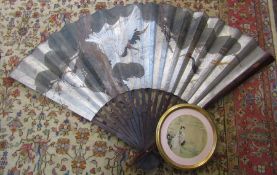 Large Oriental fan featuring storks H 102 cm & a framed circular Oriental painting on silk