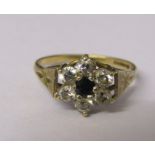 9ct gold sapphire and cubic zirconia daisy ring size L/M weight 2 g