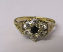 9ct gold sapphire and cubic zirconia daisy ring size L/M weight 2 g
