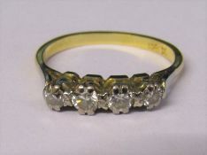 18ct gold 4 stone diamond ring, total carats 0.30,  size O weight 2.8 g