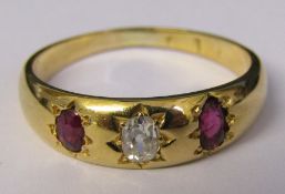 Tested as 18ct gold ruby and diamond gypsy ring (diamond 0.20 ct) size N/O weight 3.5 g