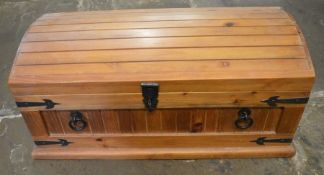 Small wooden dome topped trunk