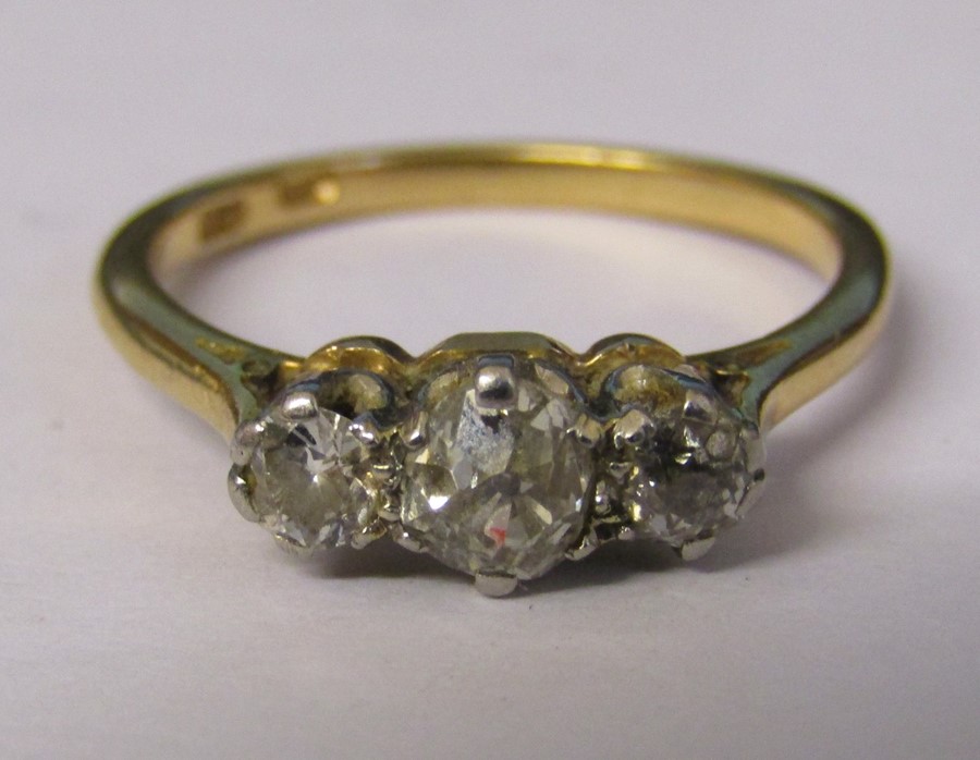 18ct gold diamond trilogy ring, central stone 0.30 ct outer stones 0.10 ct each size N total