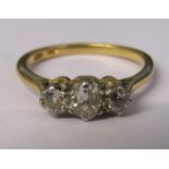 18ct gold diamond trilogy ring, central stone 0.30 ct outer stones 0.10 ct each size N total