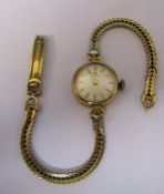 9ct gold ladies Tissot wrist watch (broken strap) total weight 14.1 g