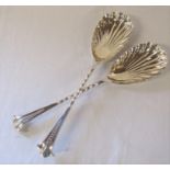 Pair of silver serving spoons with shell shaped bowls and twisted stems, Sheffield 1908 maker