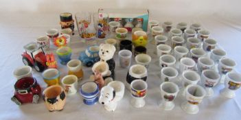 Various children's / novelty egg cups inc Tom & Jerry, The Simpsons, Top Gear, Snoopy, 2012 Olympics
