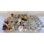 Various children's / novelty egg cups inc Tom & Jerry, The Simpsons, Top Gear, Snoopy, 2012 Olympics