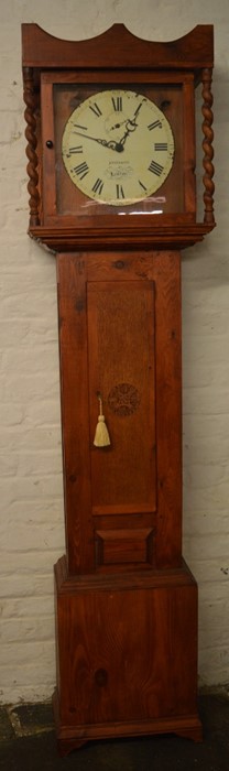 Modern battery powered longcase clock in a pine case