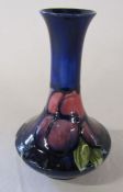 Moorcroft 'Plum Wisteria' pattern vase, blue signature to underside H 15 cm