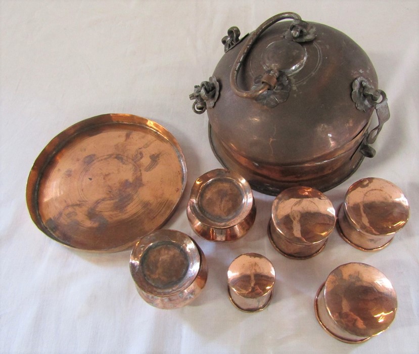 A 19th century Indian copper Paan Daan Betel nut box / Spice caddy with various pots and a plate