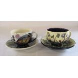 2 Moorcroft cup and saucer sets 'Bramble' and 'Ashwood Hepatica' patterns