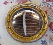 Gilt framed circular convex wall mirror D 50 cm