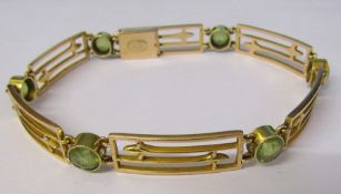 15ct gold gate bracelet with 6 peridots (broken link) total weight 13.8 g L 7.5 "