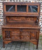 Heavily carved oak display sideboard Ht 155cm W 126cm D 57cm