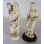 2 Meiji period ivory okimono of a man with a child on his back (missing parasol) & a man with a