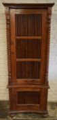 Concave wooden corner cupboard with barley twist columns Ht 175cm W 65cm